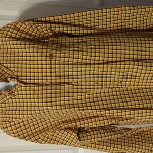 Men button down shirt, it's a large and the color of the shirt is yellow
